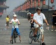 Children biking on the Xian City Wall