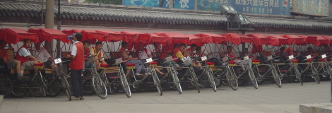 Rickshaws in a row by the Beijing Hutongs